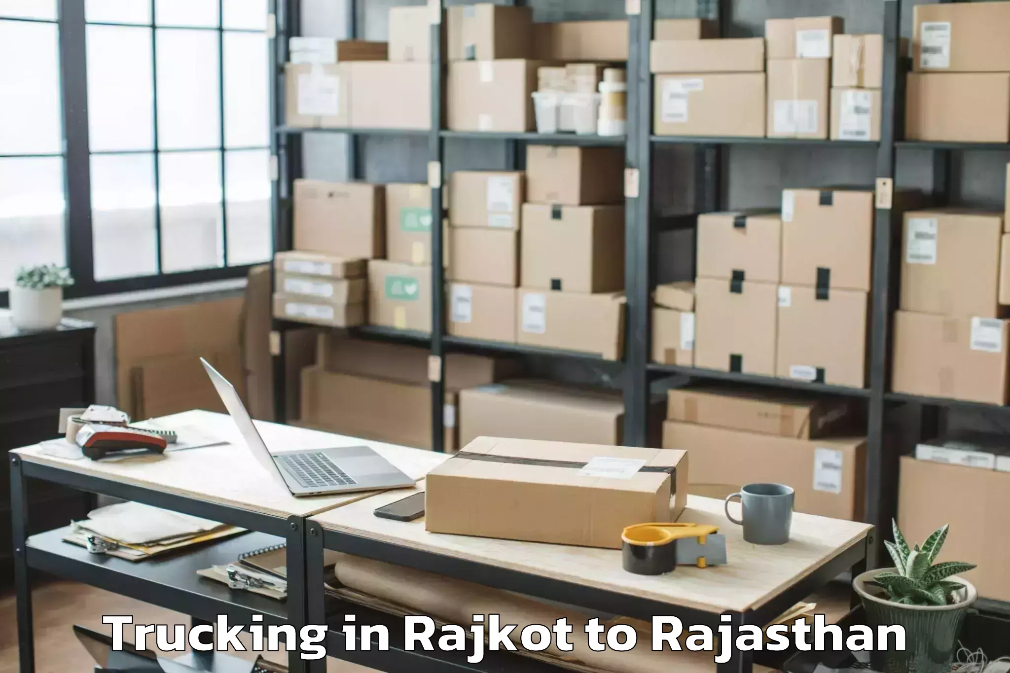 Trusted Rajkot to Central University Of Rajastha Trucking